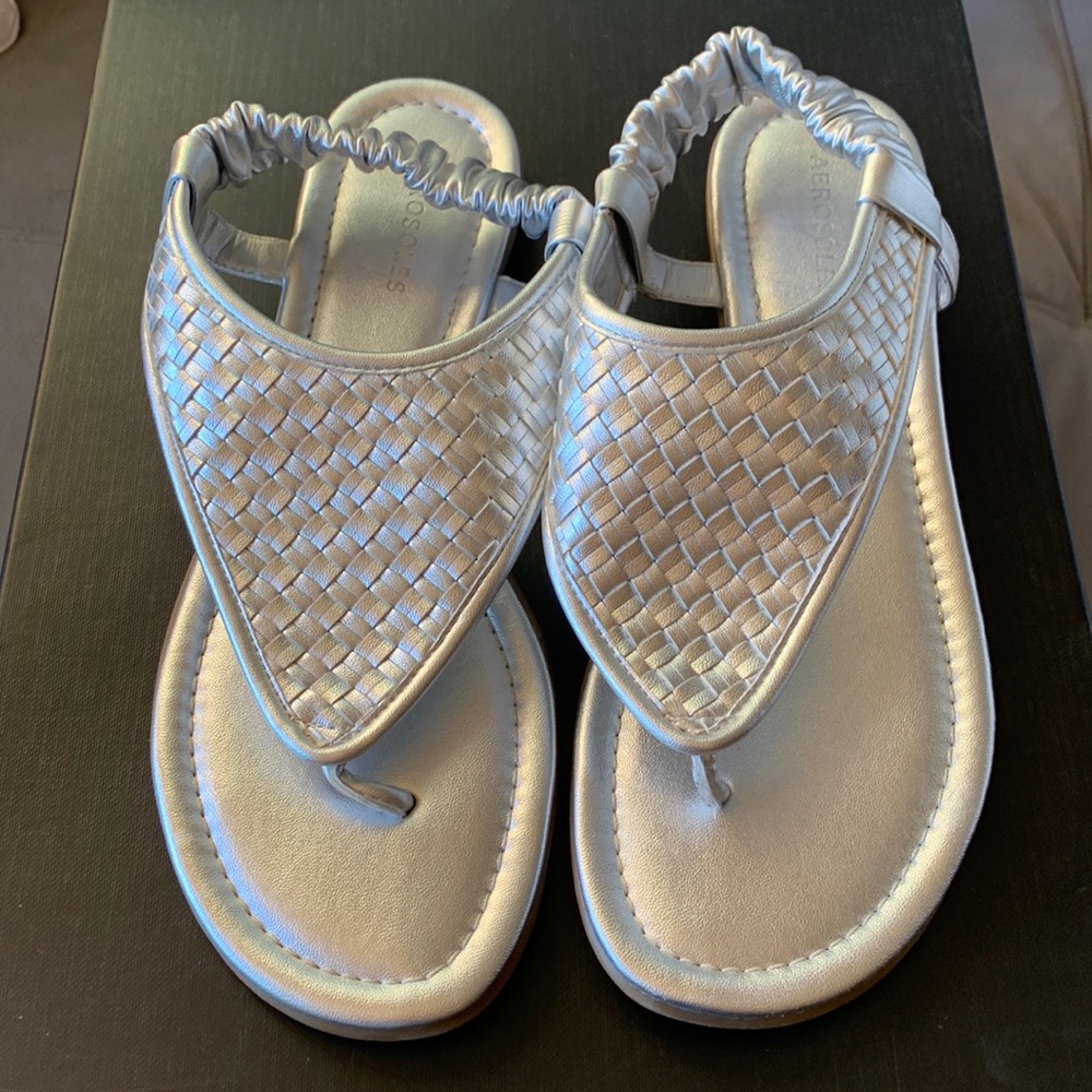 Aerosoles silver thong sandals.
